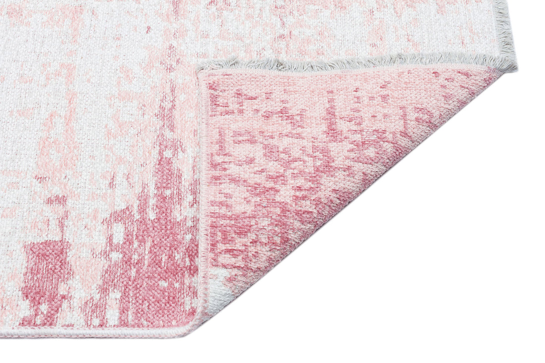 cream and pink abstract rug